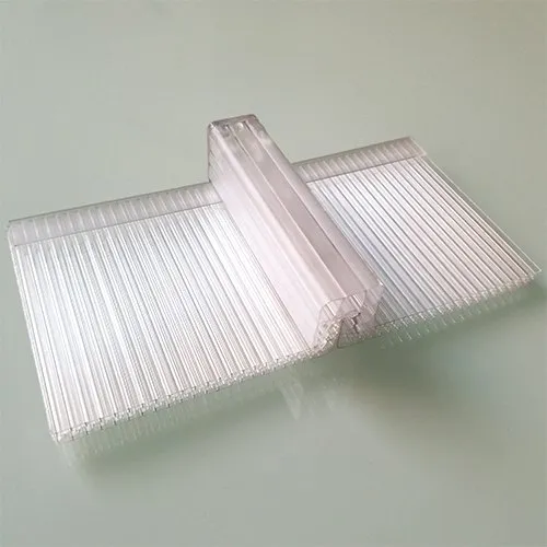 U-lock multi-cell polycarbonate panel system for standing seam roofing